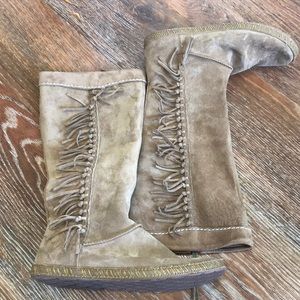 Ugg tall moccasin style boots with fringe
